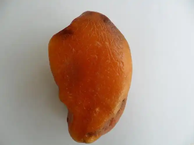 123克枣红皮陈年老蜜蜡原石(1)