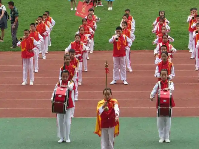 鼓号显朝气,健步展英姿————陈家渡小学参加昆明市鼓号队a级达标
