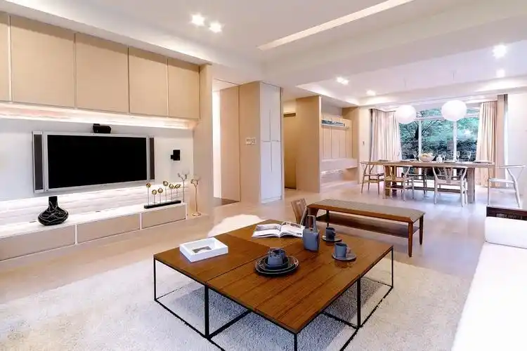 客餐一体化设计,整体采用木色材料打造,带来更多温润温馨的感觉.