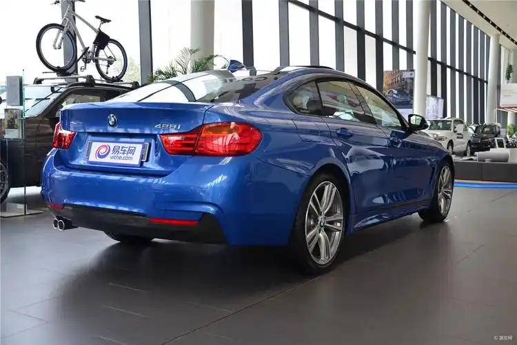 【宝马4系2014款四门轿跑车 428i 设计套装型侧前45度车头向左水平