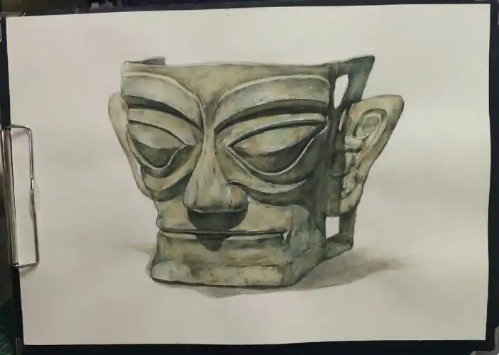 画了三星堆的青铜大面具