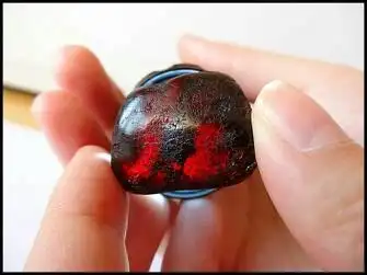 我想知道我的这个是真的血珀吗?值多少钱啊,成色怎么样啊.