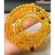 天然琥珀俄料花珀吊坠一枚配链子琥珀内含花瓣漂亮如图品相如图规矩