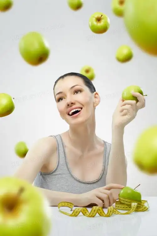 减肥瘦身美女与青苹果摄影高清图片