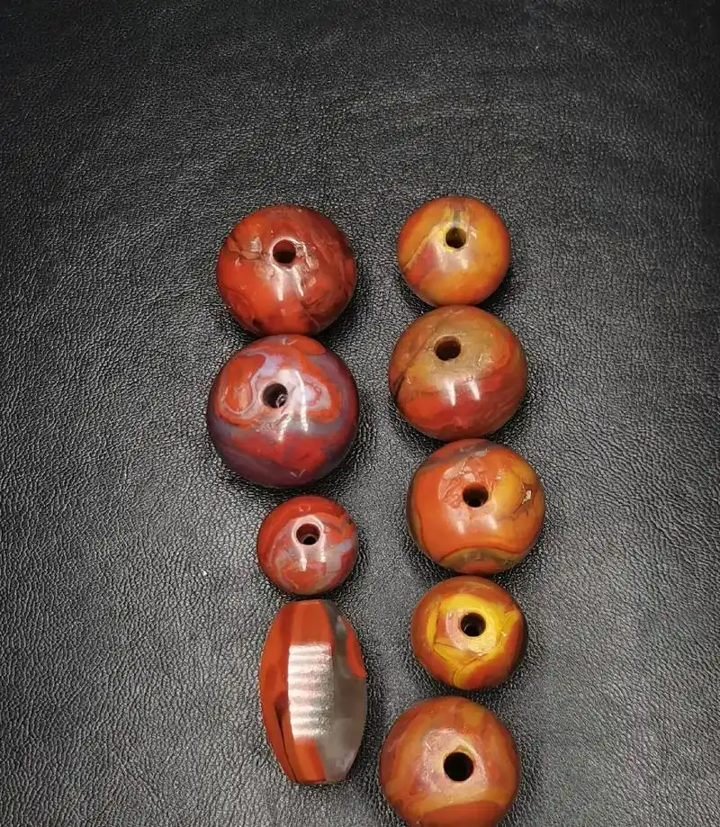 战国红玛瑙以红黄缟为主,偶有黑缟,白缟等,以颜色艳 - 抖音