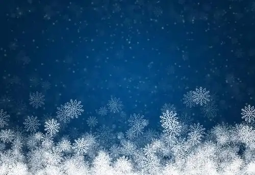 蓝色背景的白色雪花的圣诞框架.设计假日背景