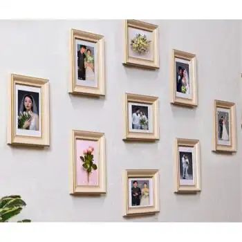 客厅背景情侣静谧蓝洗照片9张带无痕钉5寸9个组合相框可放88128cm画芯