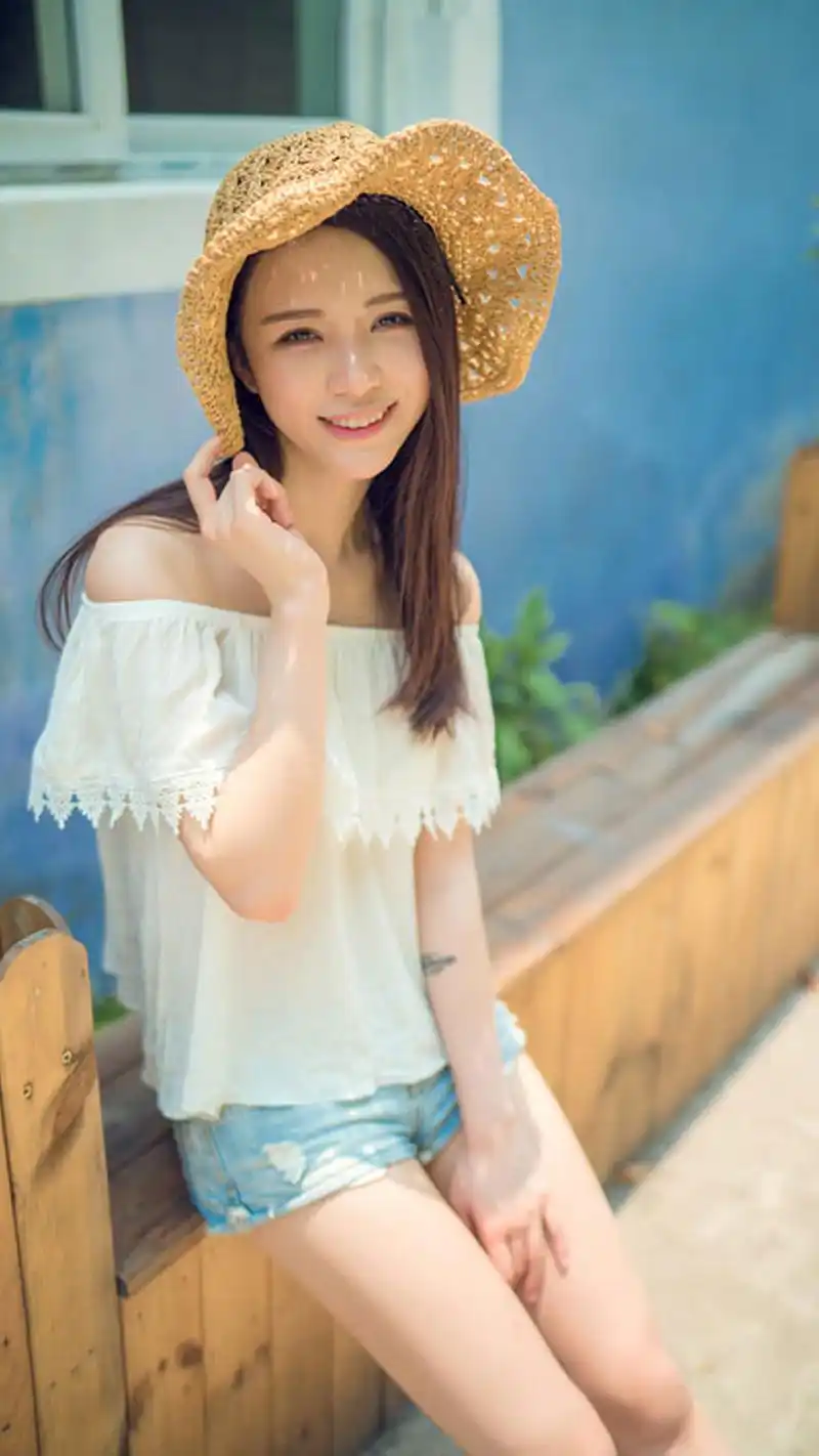 阳光女孩户外写真高清手机壁纸
