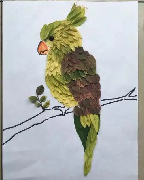 树叶贴画作品,怎样做树叶贴画图片(漂亮的创意树叶粘贴画图片作品素材