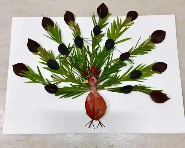 用树叶做的手工贴画图片,三年级用树叶做的手工贴画图片(漂亮的创意