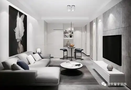 简单的l型灰色沙发,搭配悬挂的电视柜,踢脚灯,入户的小吧台构成整个