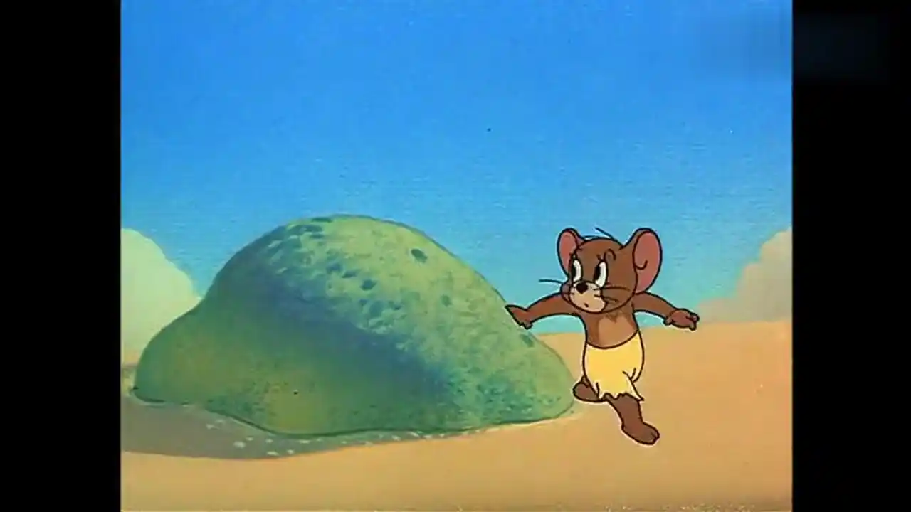 动漫壁纸:杰瑞海边游玩突然看到了猫的脚印,吓得躲在了石头后面