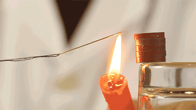 针失去磁性掉落下来用蜡烛将针烧红,step4用打火机将蜡烛点燃step3使