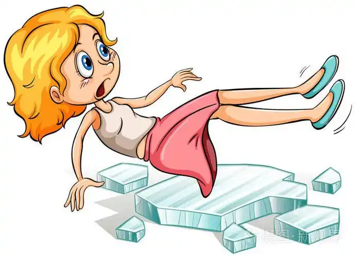 在寒冷的冰上滑倒的女孩