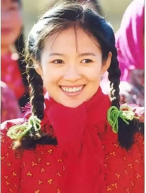 第一张是章子怡小时候的照片