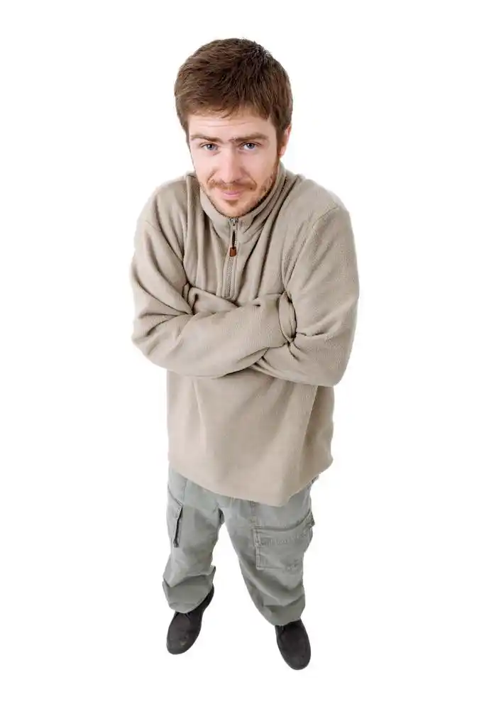 傻男人,休闲的年轻人全身在白色背景