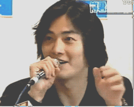 郑伊健捂嘴讲话扭头gif动图_动态图_表情包下载_soogif