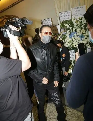 李香琴追悼会遗产将盖13所希望小学马云刘德华成龙到场送别