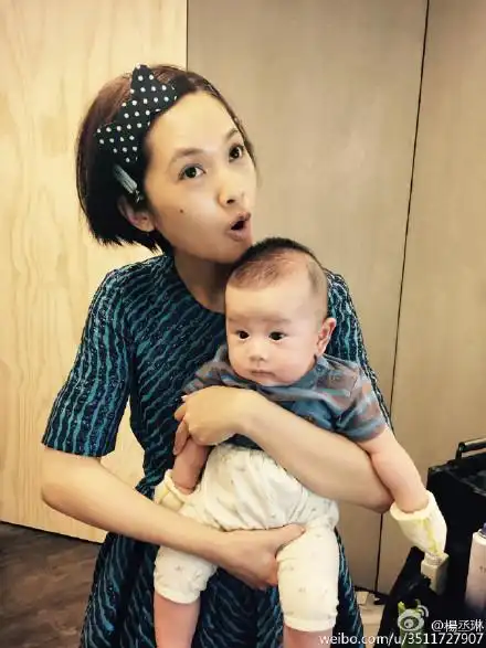 杨丞琳晒抱宝宝照片网友快和李荣浩生一个