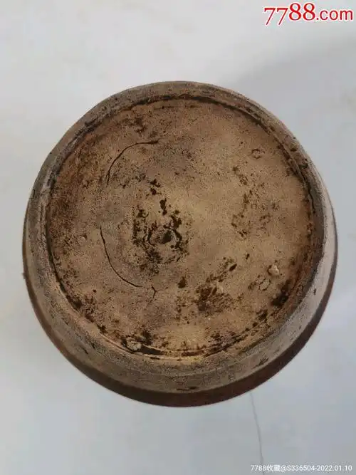 清朝酱黄釉四系罐