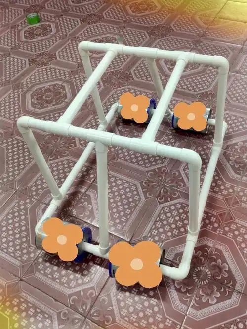 奶粉罐回收利用水管diy学步车