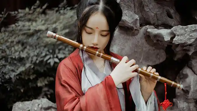 古风美女吹笛子图片一,何谓作品风格 竹笛作品风格所具有的不同地域