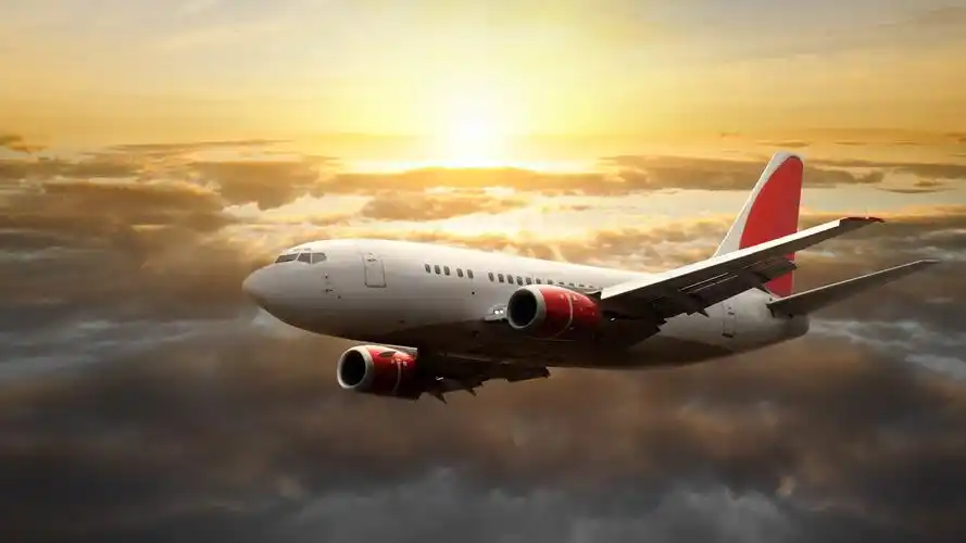 飞机飞行在夕阳的天空 壁纸 - 1920x1080