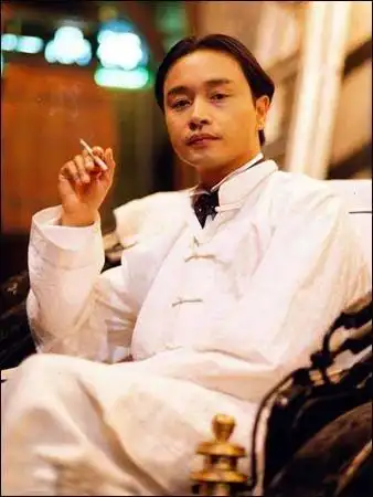 谁有张国荣手拿香烟的桌面图片啊,1280×800的.谢谢了.