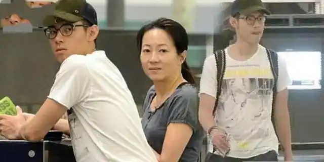 68岁谭咏麟全家照,儿子学霸文武双全,然而两任老婆的差别太大