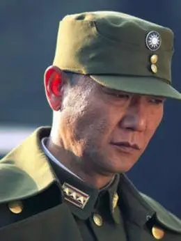 丁成义(冯国强饰演)