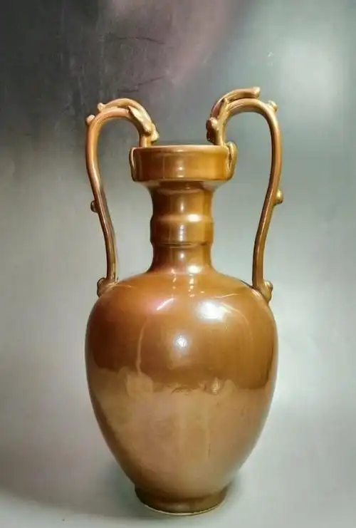 北宋定窑紫金釉双龙尊.