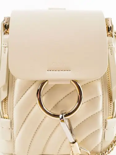 chloé chloé embossed logo backpack