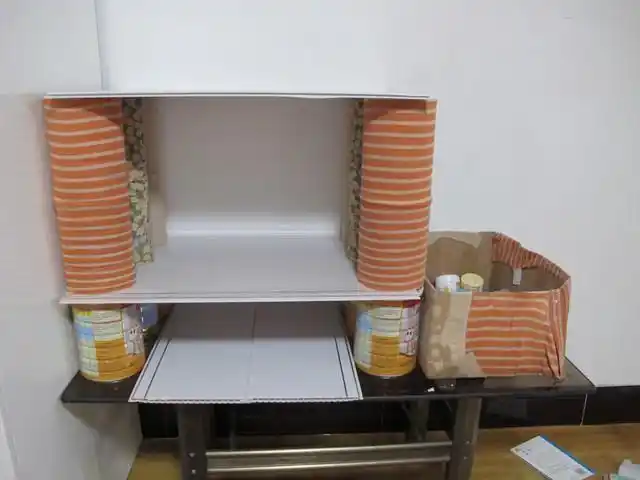 废旧奶粉罐diy小书柜,就这么拼合一个书柜吧.