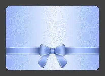 亮蓝色礼品卡用丝带和漩涡装饰照片