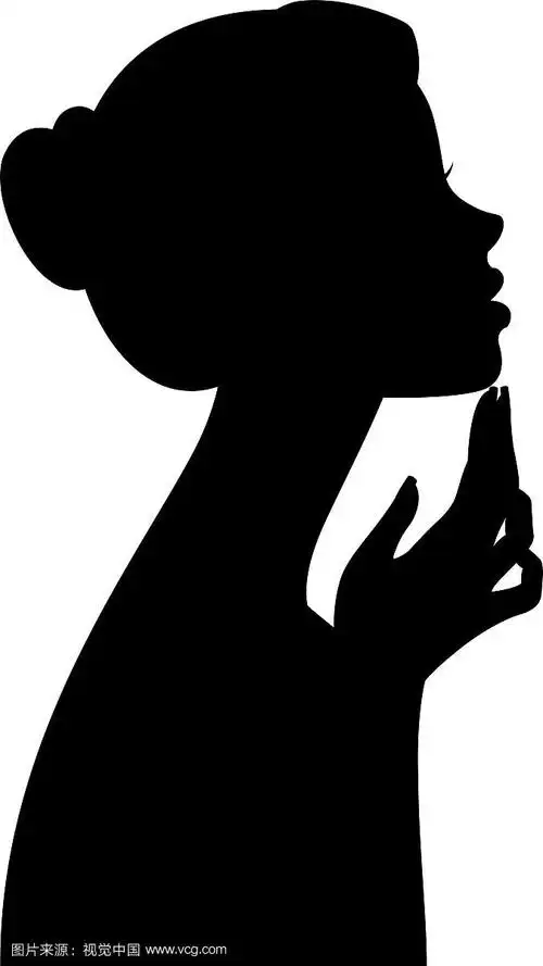 一个女孩的剪影肖像在侧面孤立