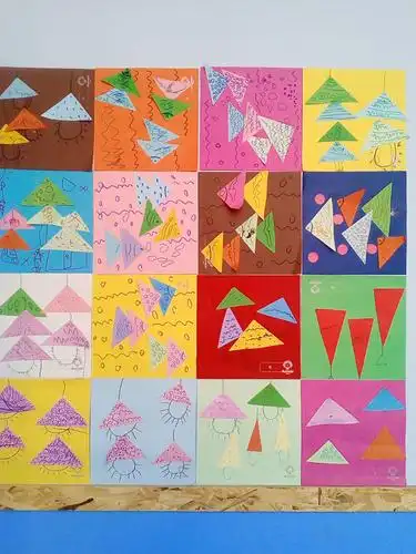 本月的美术活动主题一一三角形变魔术