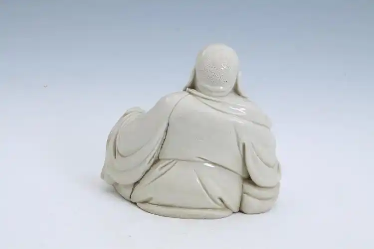 泉州市博物馆明德化窑何朝宗印款白釉弥勒像