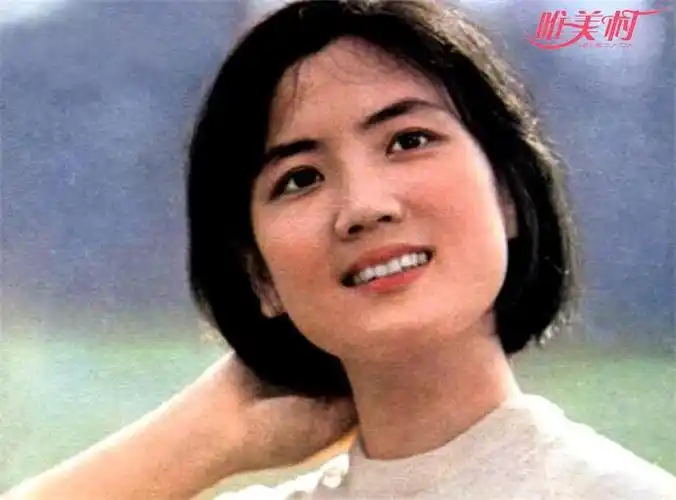 李秀明年轻时照片