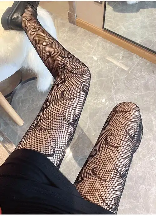 可莉允黑丝袜女薄款秋冬性感辣妹鱼网连裤网袜网红jk潮牌字母黑色渔