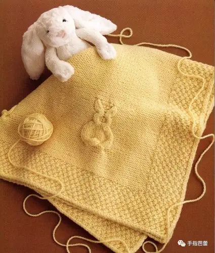 全手工棒针编织的童毯