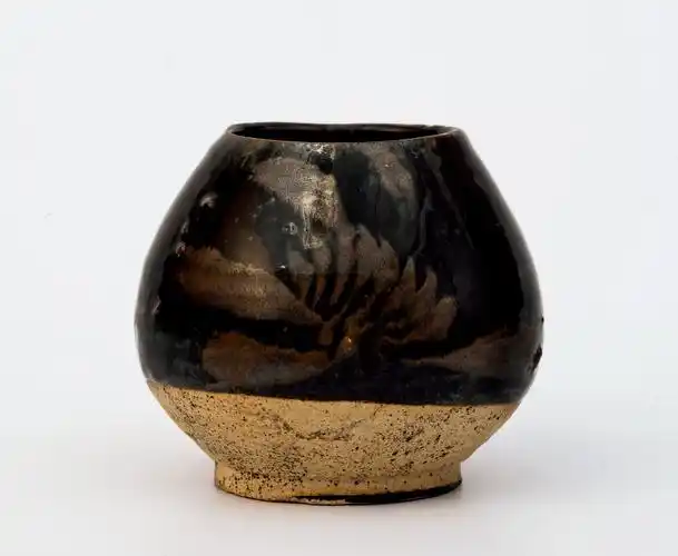 元 黑釉铁锈斑鸡心罐