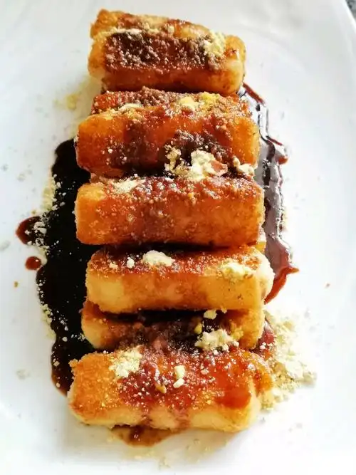 红糖糍粑小屁孩开心得就快见牙不见眼了