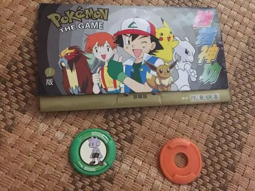 1,弹指神功 这东西非常廉价,每一包拆开就有三十张左右,配套的还有一