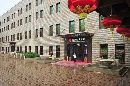 梅州客商银行开业1周年特别报道南方日报对话董事长宁远喜