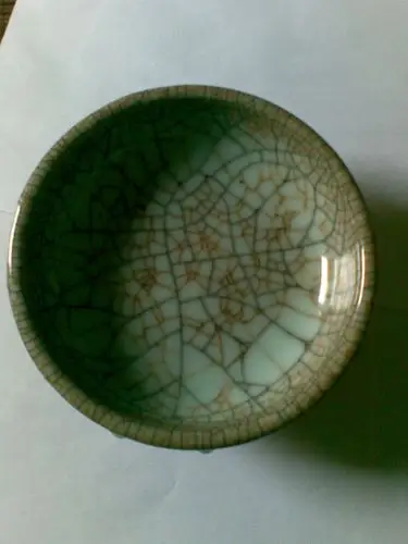 鉴定讨论 陶瓷 直径165mm,高65mm,周边两排共26颗乳丁,三只铁足,底部