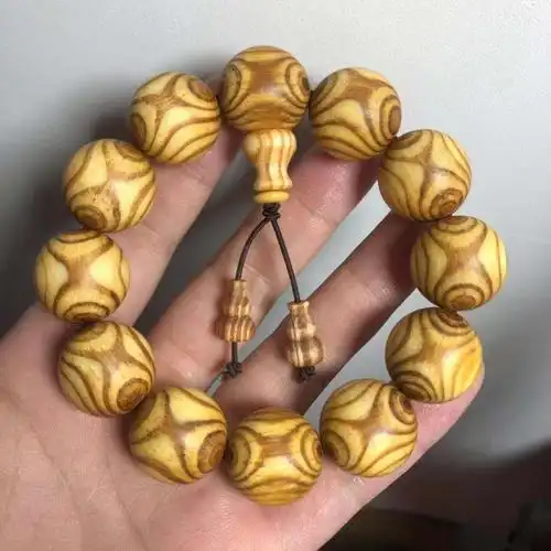 热销紫檀柳手串对眼鬼脸_新品对眼鬼脸手串琥珀木满油全透沉香紫檀柳