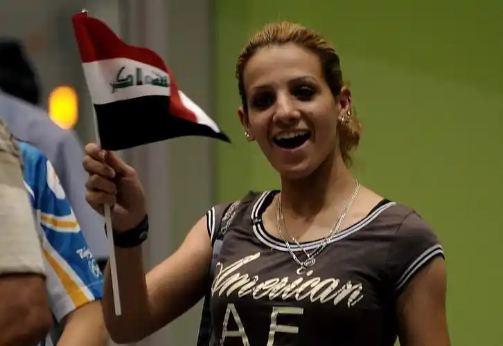 达娜·侯赛因到达首都机场_网易奥运图片