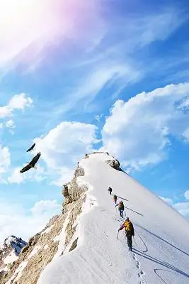 蓝天白云简约唯美登山山顶日出团队发展背景