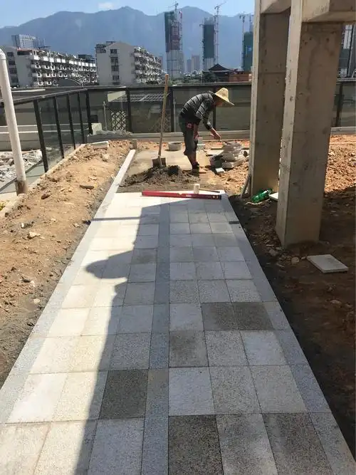 美地小区屋面地面石材铺贴