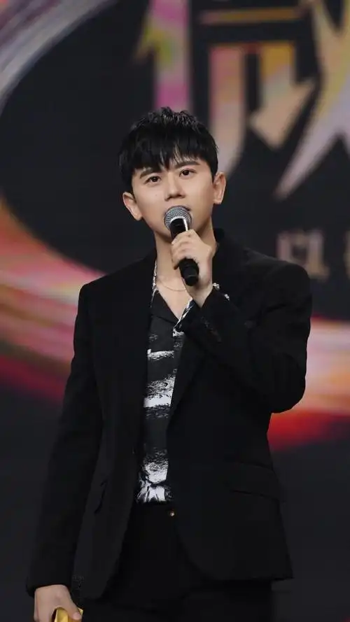 歌手张杰歌声好听非常好听认真负责的奶爸来看帅照